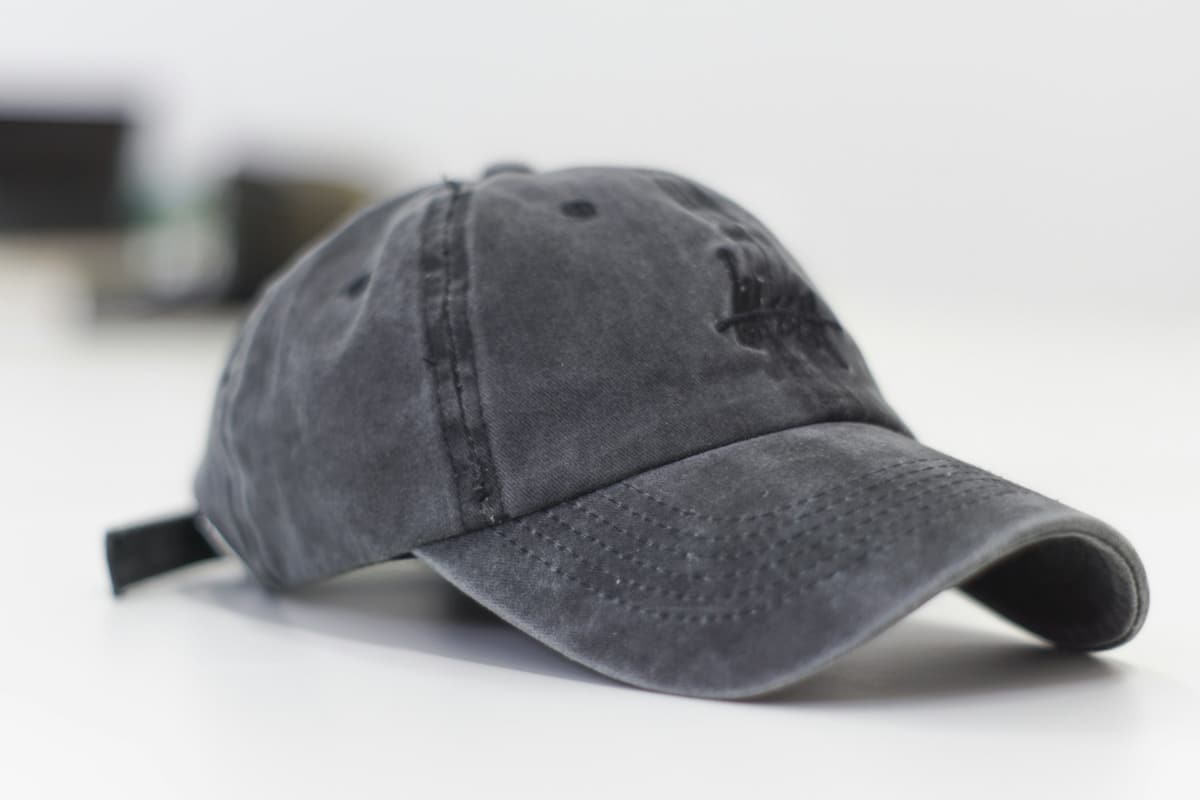 Headwear — Embroidery and transfer on structured and unstructured caps alike.