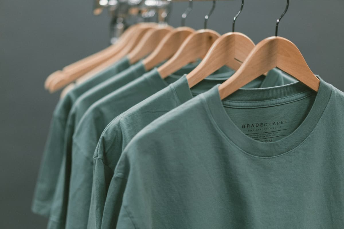 Team & Staff Shirts — Names and numbers printed individually across a squad, in a single production run.